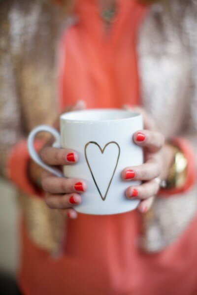 daily coffee in a pretty gold heart mug from west elm